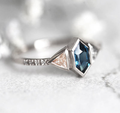 Hexagon-shaped blue sapphire ring with diamond pave