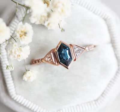 Hexagon-shaped blue sapphire ring with diamond pave