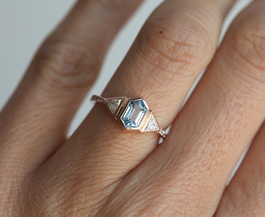 Hexagon Aquamarine Ring with 2 Side Triangle White Diamonds and Pave Diamonds on the Band