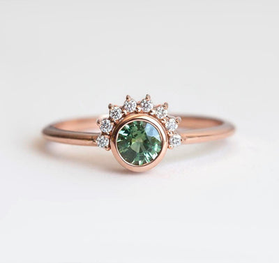 Round green sapphire ring with diamond halo