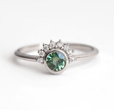 Round green sapphire ring with diamond halo
