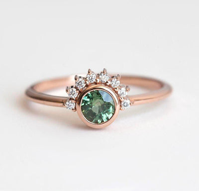 Round green sapphire ring with diamond halo