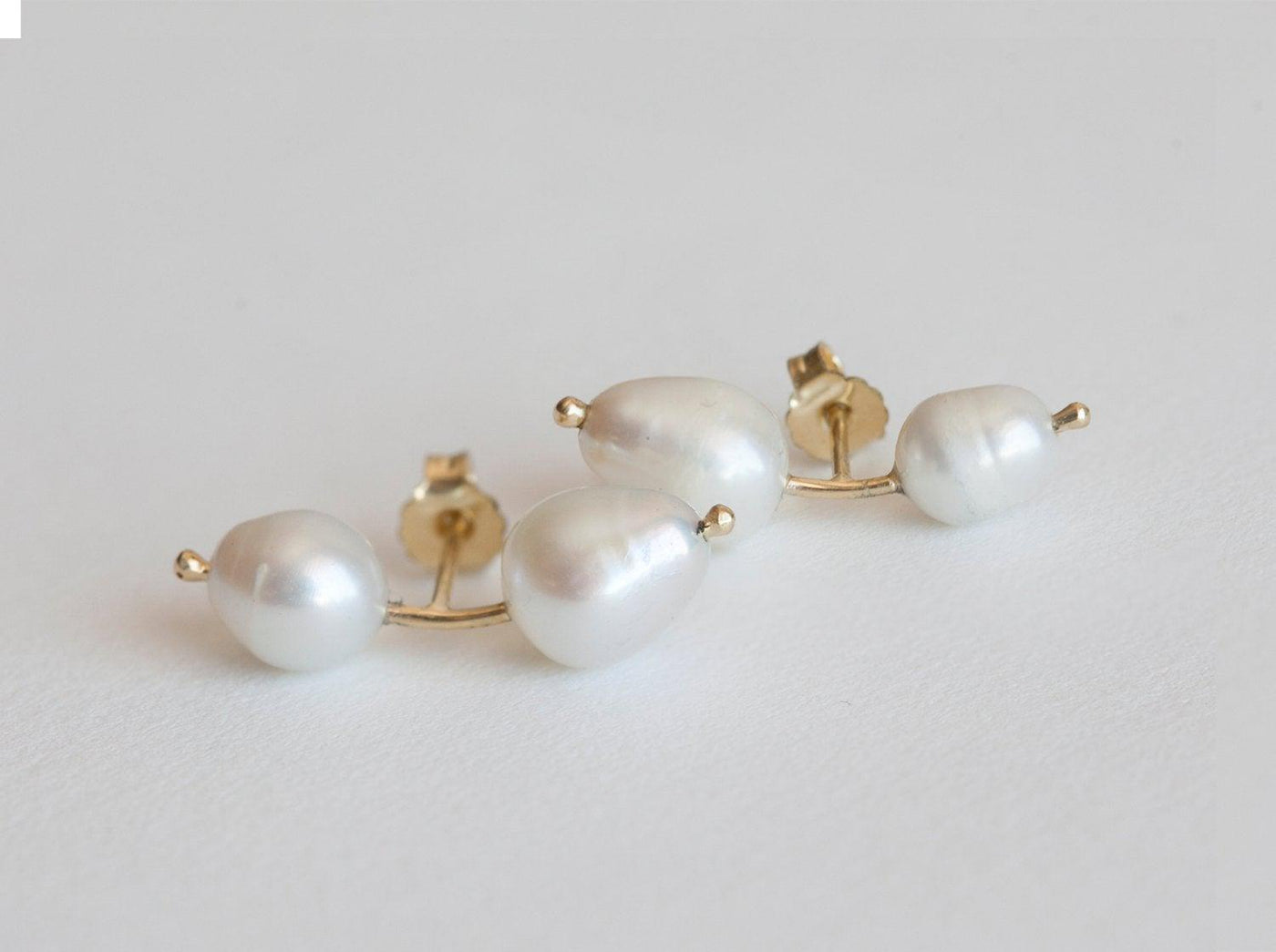 White pearl stud gold earrings