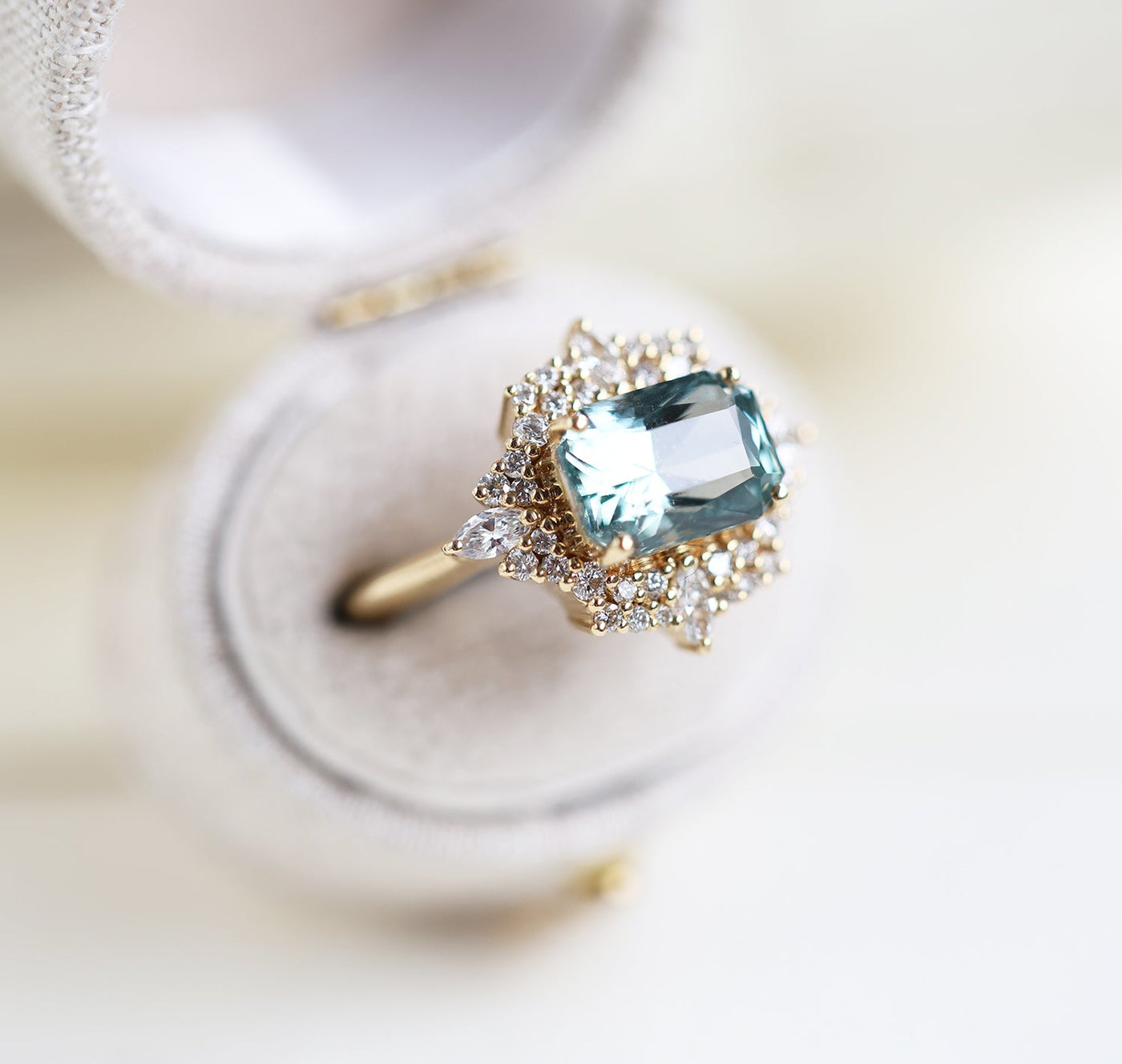 Mint sapphire diamond ring with halo diamonds