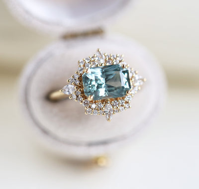 Mint sapphire diamond ring with halo diamonds