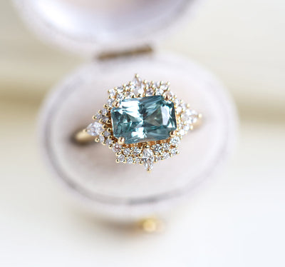 Mint sapphire diamond ring with halo diamonds