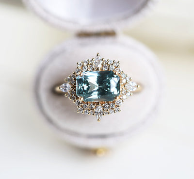 Mint sapphire diamond ring with halo diamonds