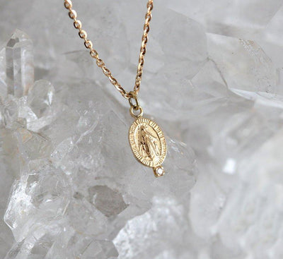 Virgin Mary necklace with round white diamond