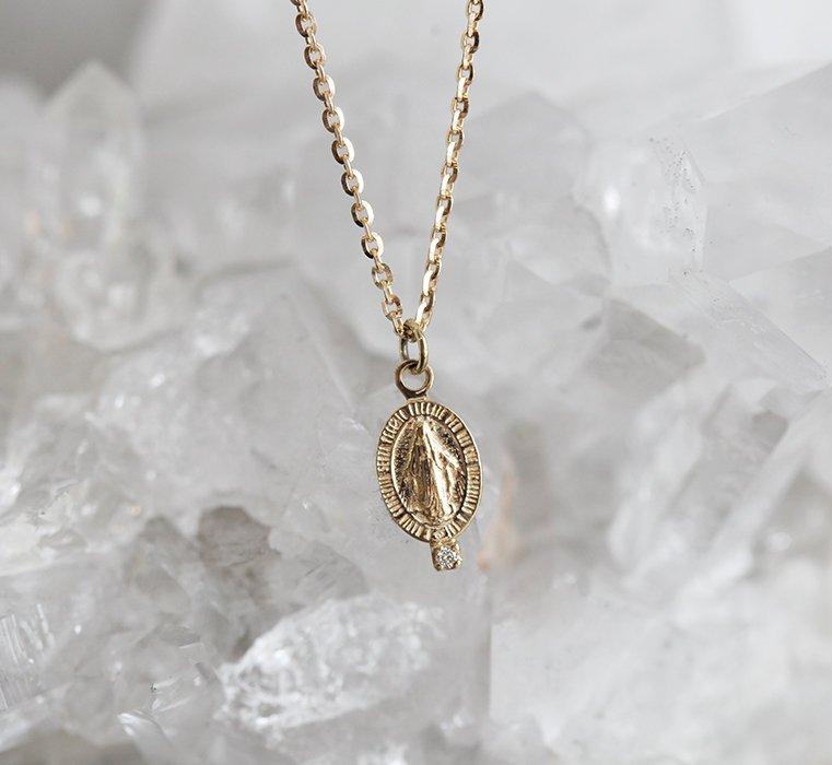 Virgin Mary necklace with round white diamond