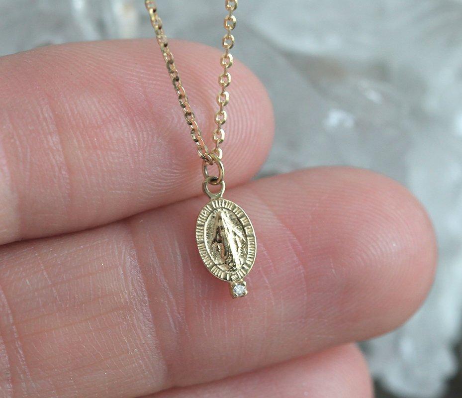 Virgin Mary necklace with round white diamond