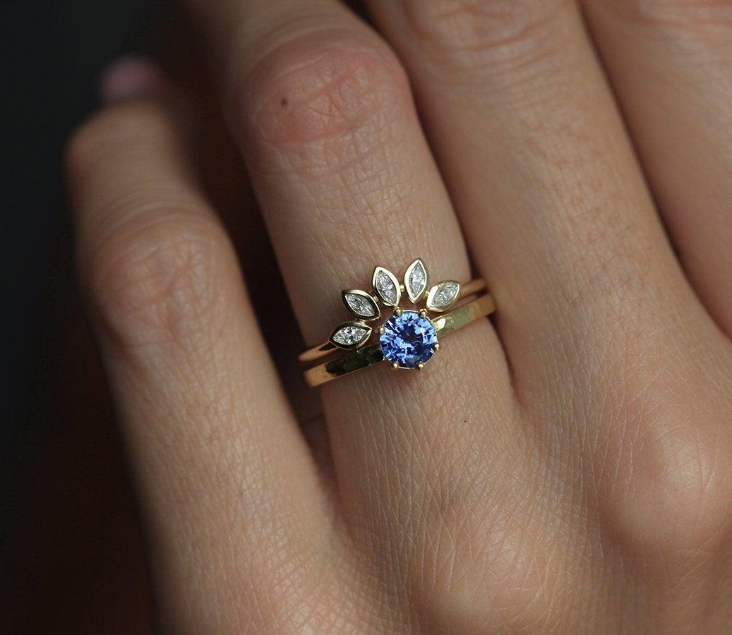 Round blue sapphire solitaire ring
