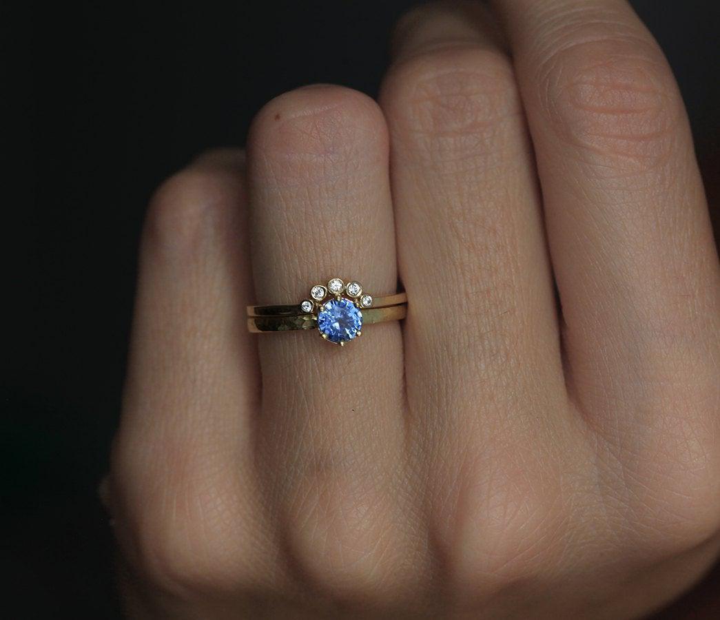 Round blue sapphire solitaire ring