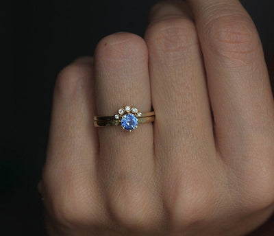 Round blue sapphire solitaire ring