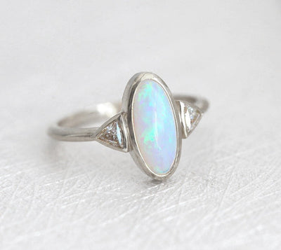 Three Stone Oval Opal Ring with 2 Accent Triangle-Cut White Diamonds