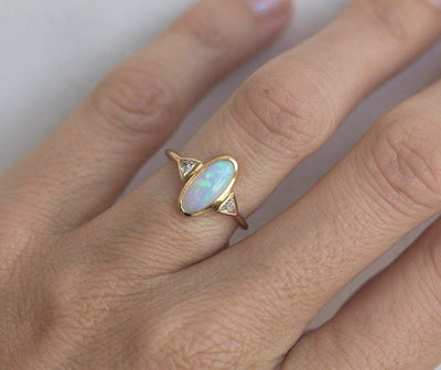 Three Stone Oval Opal Ring with 2 Accent Triangle-Cut White Diamonds