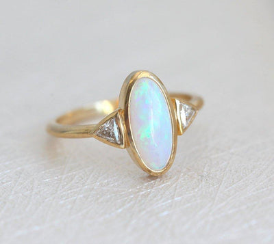 Three Stone Oval Opal Ring with 2 Accent Triangle-Cut White Diamonds