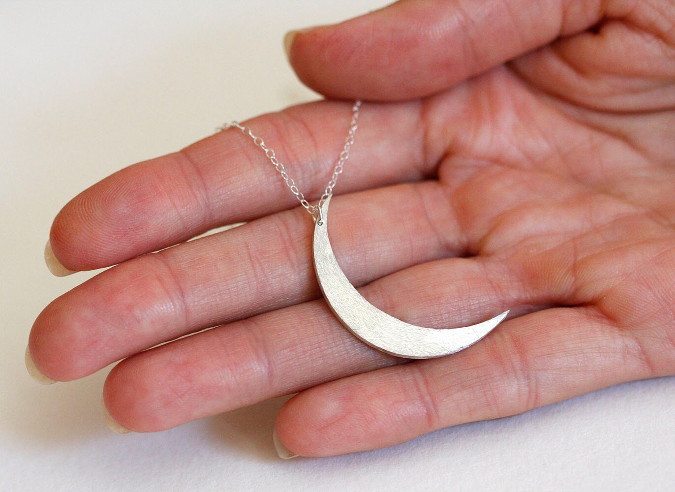 Silver crescent moon necklace