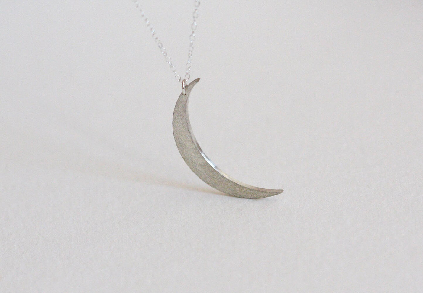 Silver crescent moon necklace