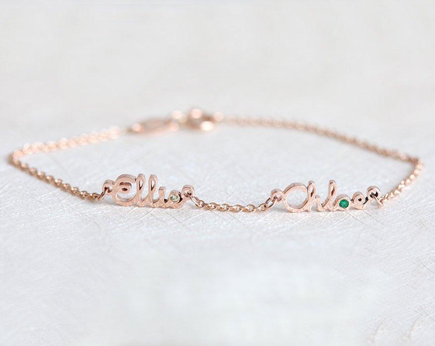 Rose gold chain bracelet with two personalized names and birthstones