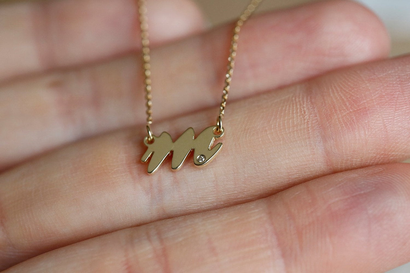 Gold mother initial necklace
