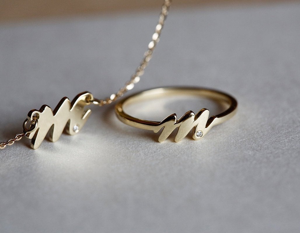 Gold mother initial necklace