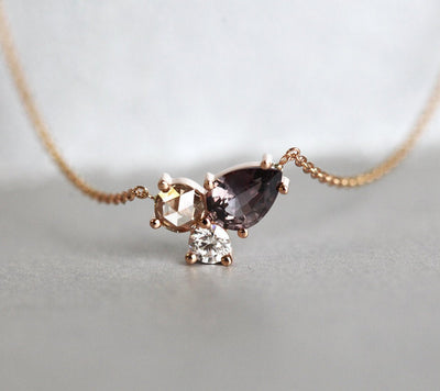 Pear-shaped burgundy champagne sapphire necklace with white diamonds
