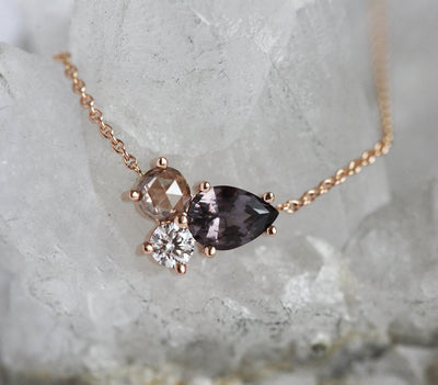 Pear-shaped burgundy champagne sapphire necklace with white diamonds