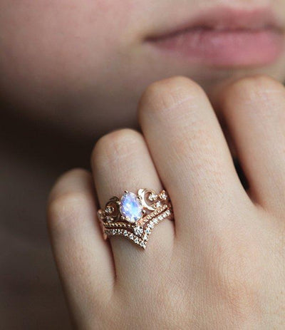 Elegant Moonstone Ring Set with oval Moonstone and Diamonds on hand.