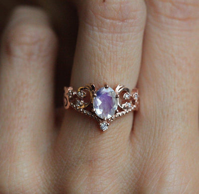 Elegant Moonstone Ring Set with oval Moonstone and white Diamonds.