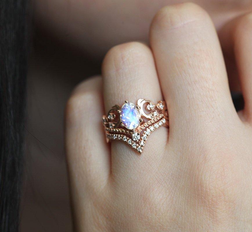 Elegant Moonstone Ring Set with oval Moonstone and Diamonds on hand.