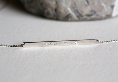 Silver personalized nameplate chain necklace with round white zirconia stones