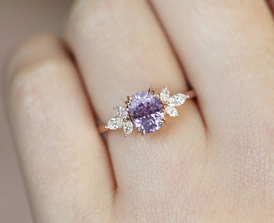 Cushion-cut blue lavender sapphire cluster ring with white diamonds
