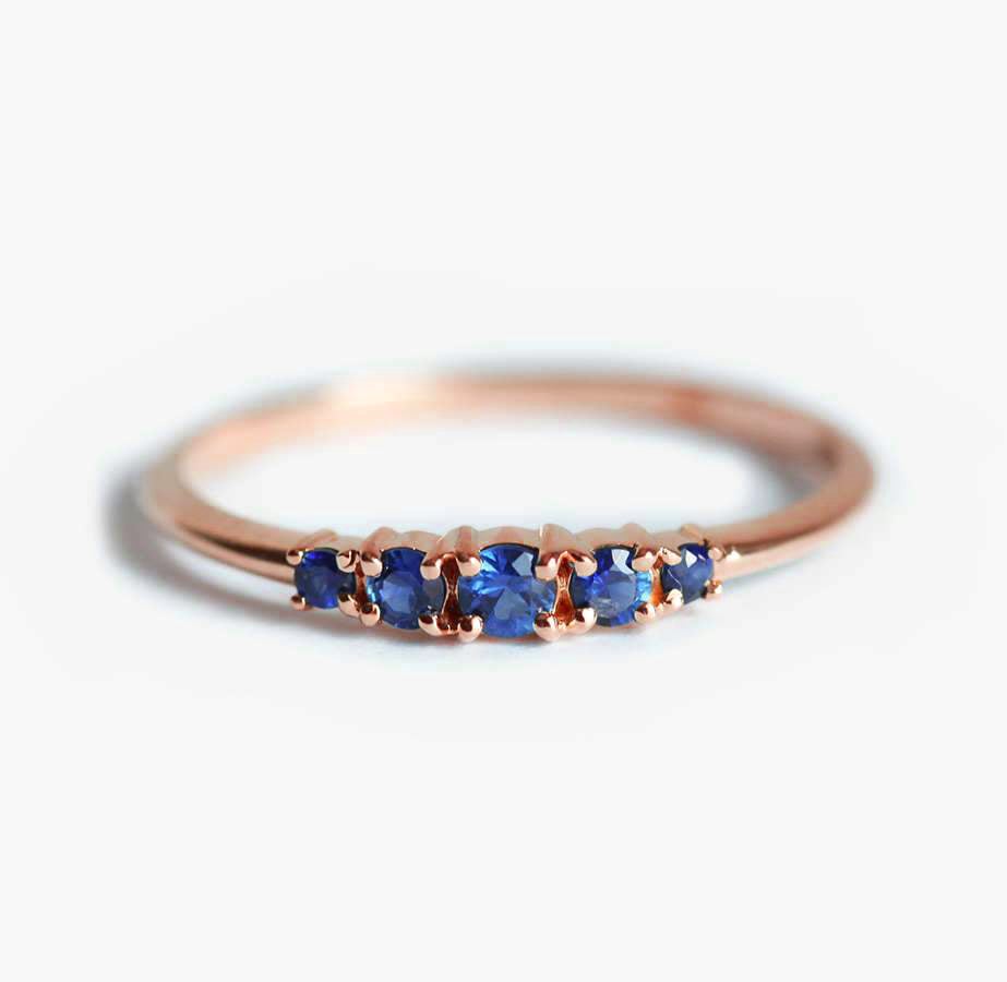 Round blue sapphire cluster ring