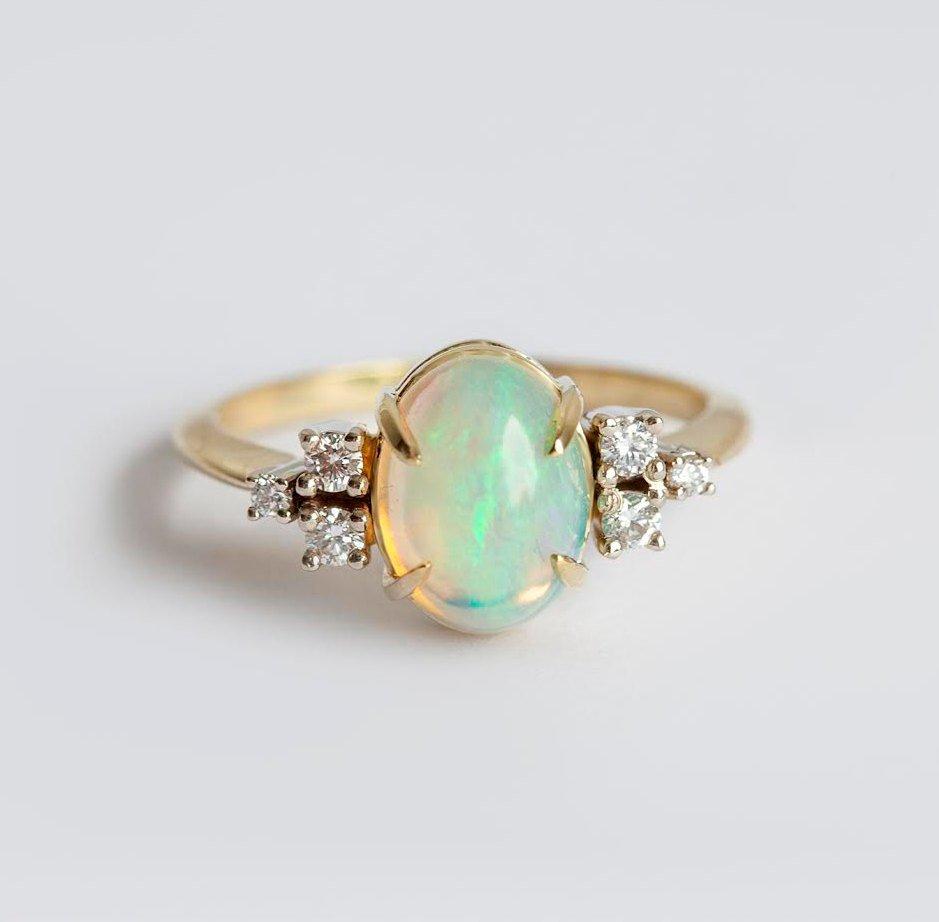 Cabochon Rainbow Oval Opal Wedding Ring with Side White Round Diamonds