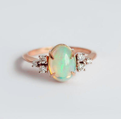 Cabochon Rainbow Oval Opal Wedding Ring with Side White Round Diamonds