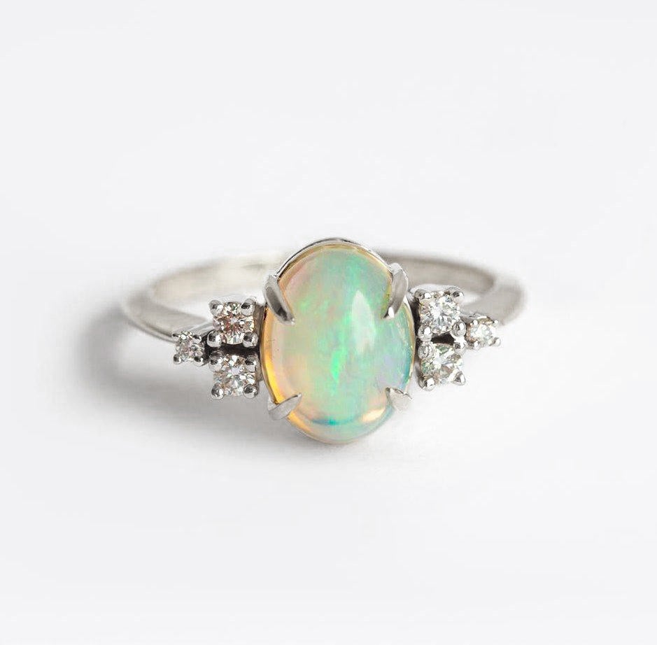 Cabochon Rainbow Oval Opal Wedding Ring with Side White Round Diamonds