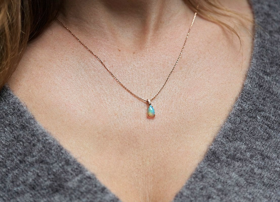 Pear-shaped australian opal and diamond gold chain necklace