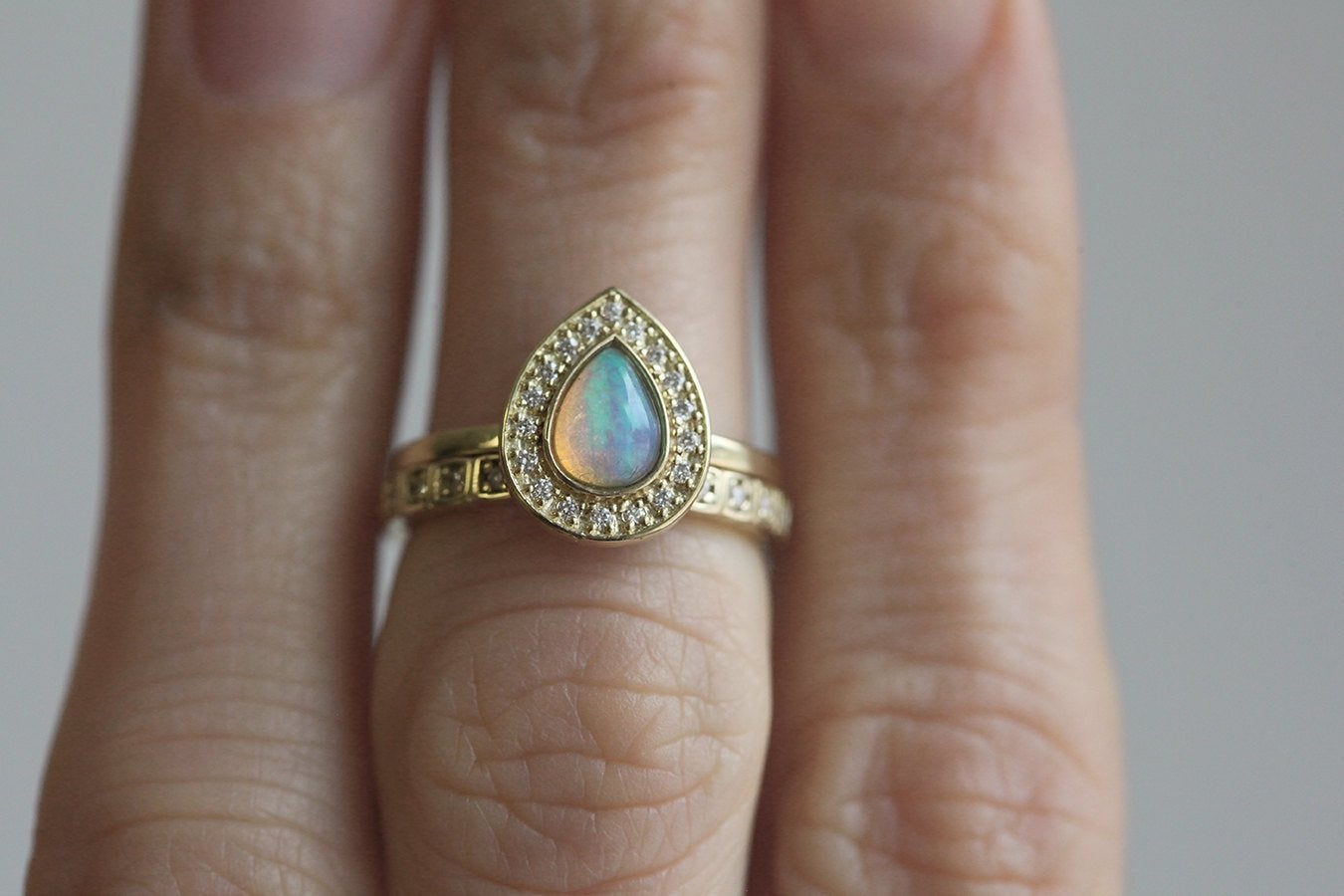 Pear Opal Halo Ring Set with Round White Diamonds