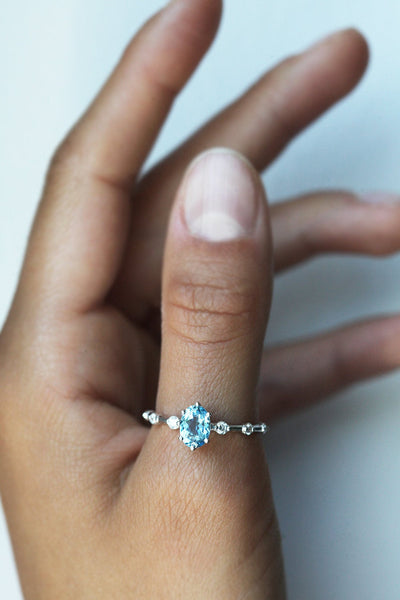 Blue Oval Aquamarine Engagement Ring with Side White Diamonds