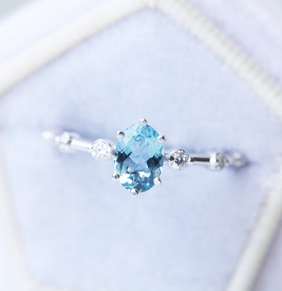 Blue Oval Aquamarine Engagement Ring with Side White Diamonds