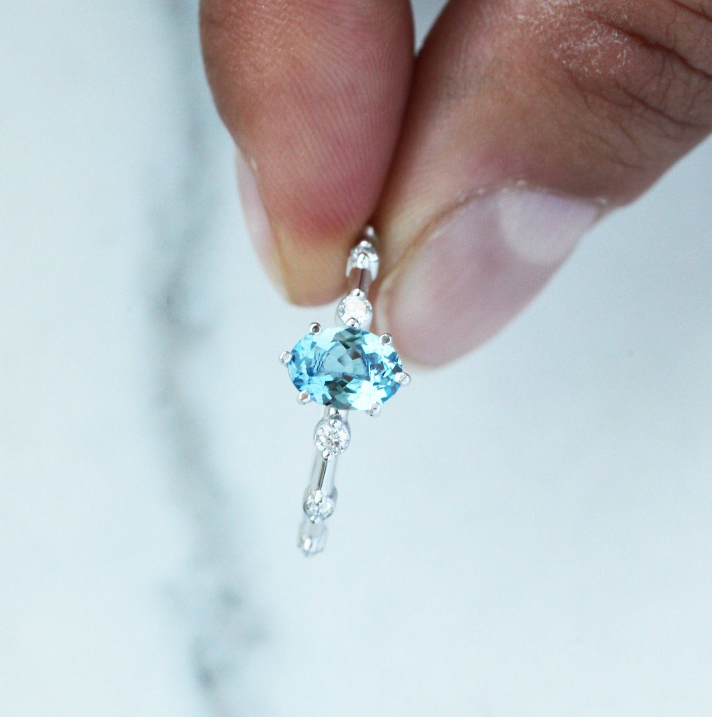 Blue Oval Aquamarine Engagement Ring with Side White Diamonds