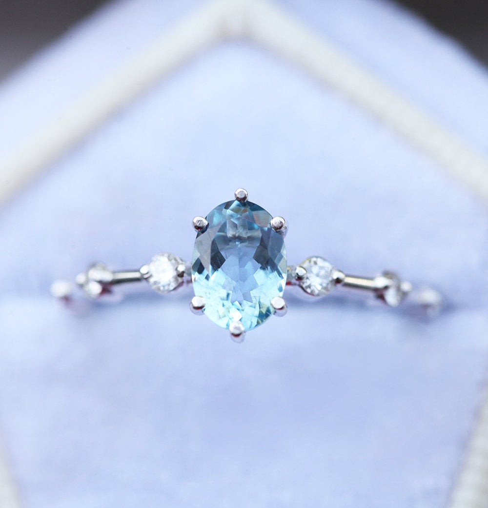 Blue Oval Aquamarine Engagement Ring with Side White Diamonds