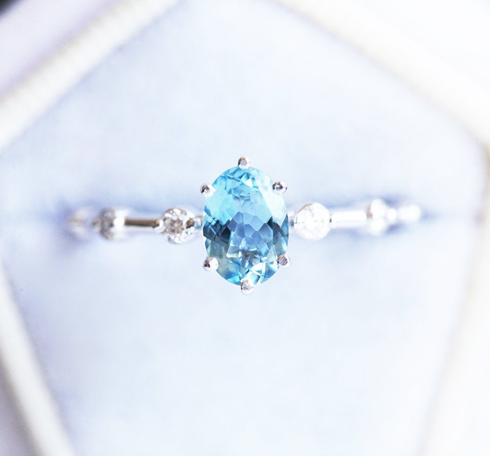 Blue Oval Aquamarine Engagement Ring with Side White Diamonds