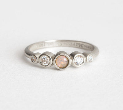 Round Opal Ring with Round White Symmetrically Placed Diamonds