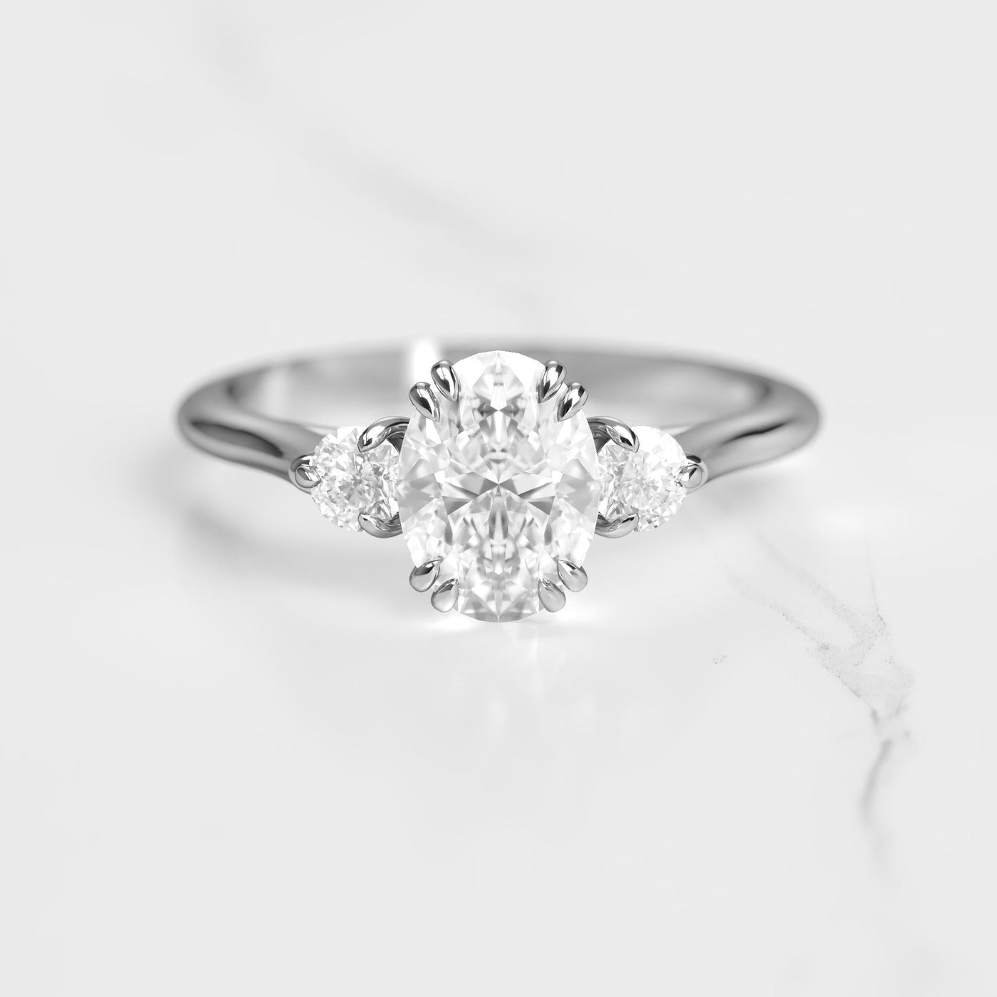 3-Stone oval-shaped white natural diamond ring