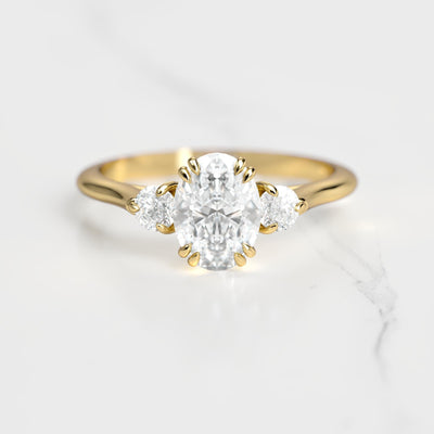 3-Stone oval-shaped white natural diamond ring