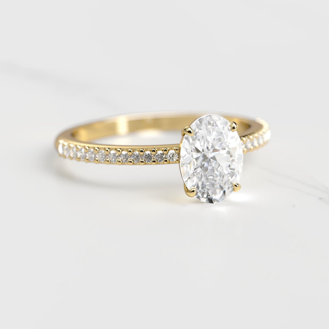 Oval half pave moissanite ring