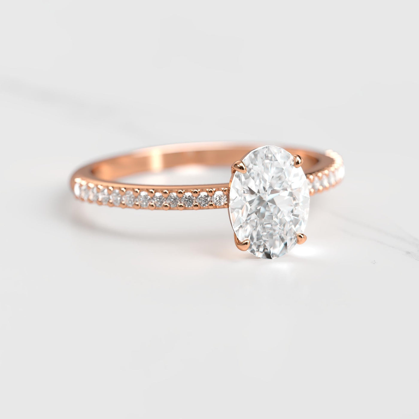 Oval half pave moissanite ring