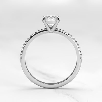 Oval half pave moissanite ring