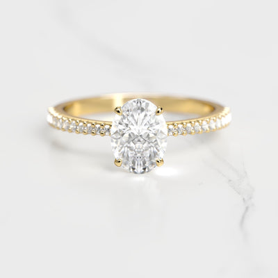 Oval half pave tapered moissanite ring